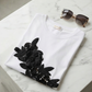 T-shirt blanc avec Fleurs et strass noir