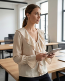Blouse volantée beige
